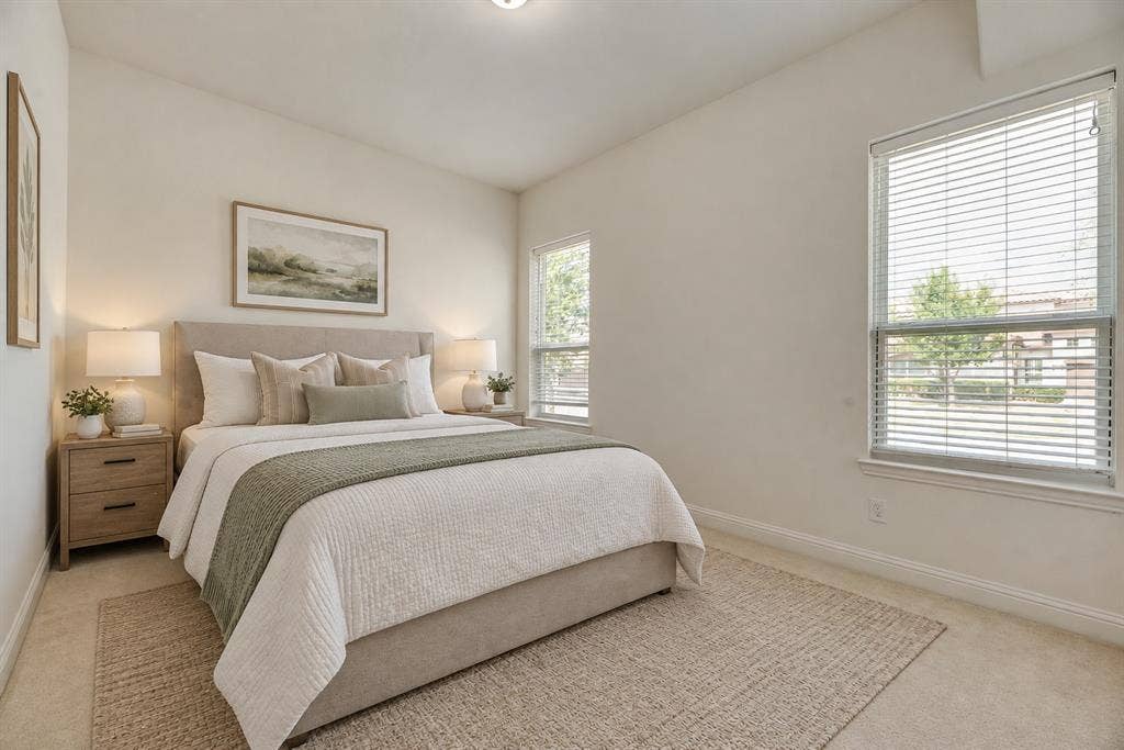 2408 Brisbane Lane, Plano, TX 75075 Virtually Staged. 2nd Downstairs Bedroom bedroom with two windows, a ceiling light fixture, and light-colored wall paint