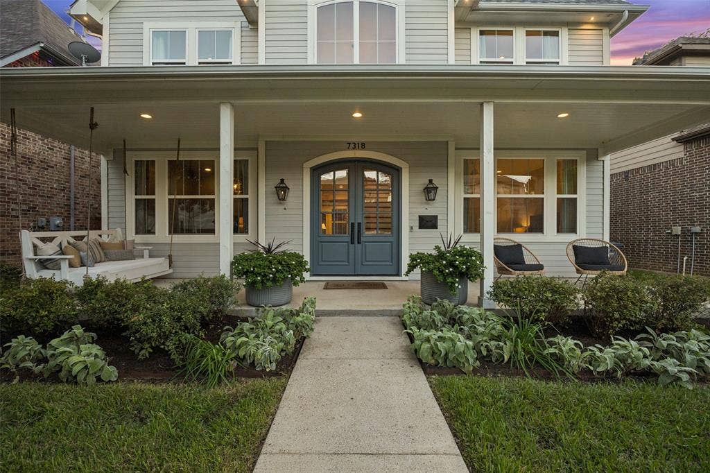 7318 Casa Loma Avenue, Dallas, TX 75214 Relax in the evenings on your front porch swing.