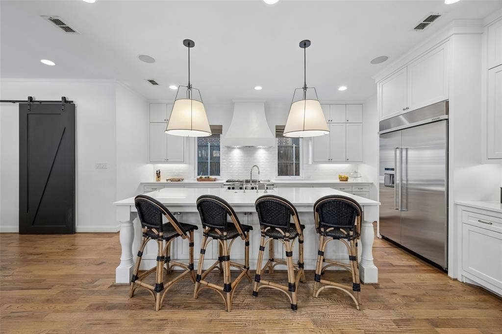 7318 Casa Loma Avenue, Dallas, TX 75214 Beautiful white on white kitchen with walk in pantry.
