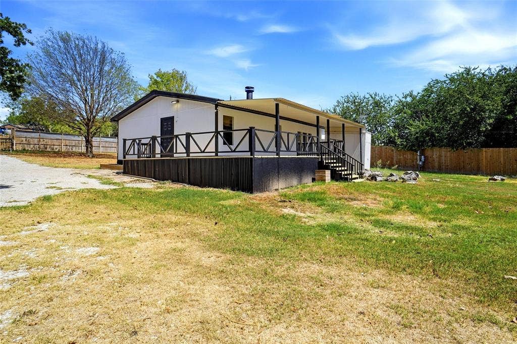 276 Wonder Drive, Springtown, TX 76082 View of Back Covered Porch and Side Decking