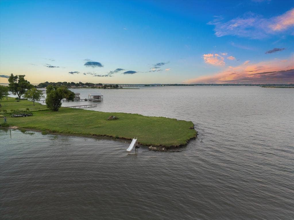 308 Causeway Cove, Seven Points, TX 75143 Waterfront property with a natural shoreline and mature trees