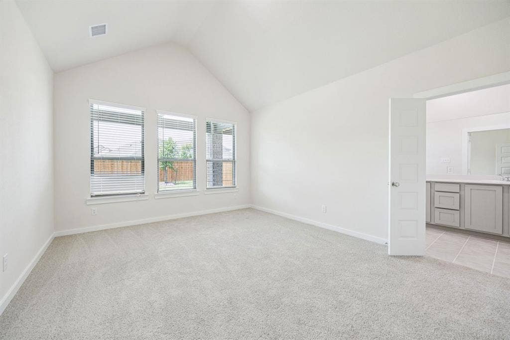 Primary Suite in the Claret home plan by Trophy Signature Homes – REPRESENTATIVE PHOTO