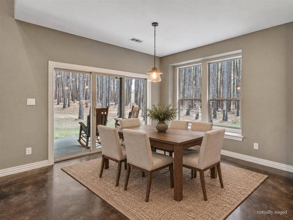 Virtually staged Dining area with beautiful views