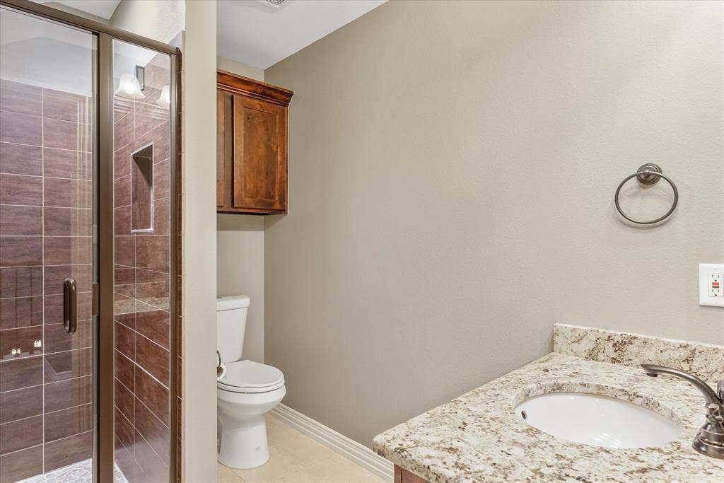 Upstairs full bathroom with shower