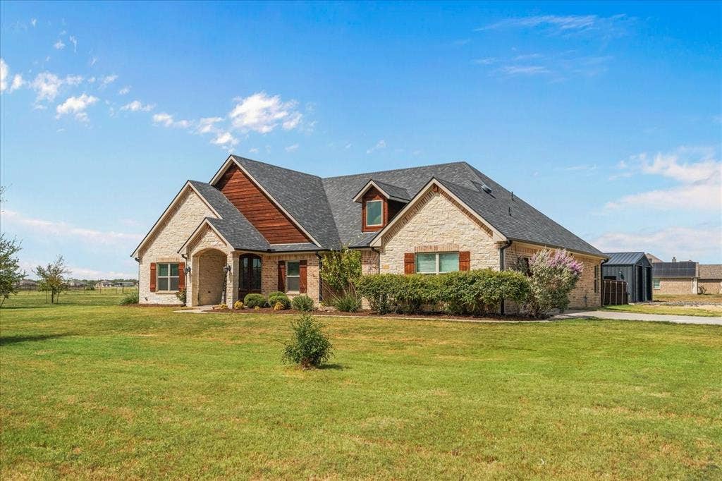 3674 County Road 2142, Caddo Mills, TX 75135 Stone exterior with wood siding accents