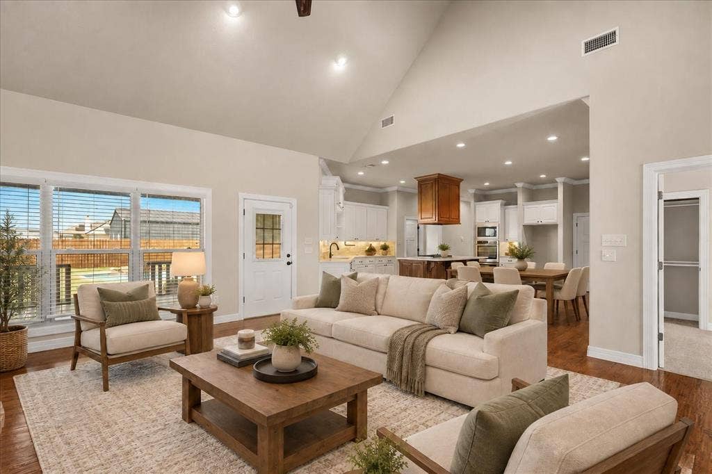 3674 County Road 2142, Caddo Mills, TX 75135 Vaulted ceiling, recessed lighting, wood-finish flooring, white trim, and a glass-paneled exterior door
