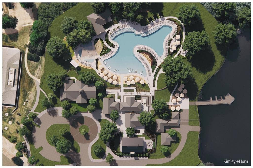 6508 Courtyards Drive, McKinney, TX 75072 Expansive property with a large, freeform swimming pool, multiple leisure areas with umbrellas, a private dock extending into the water, a well-defined circular drive, and lush green landscaping