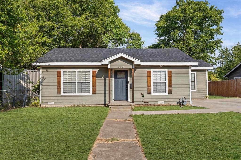 3605 Rolando Avenue, Waco, TX 76711 Front exterior with horizontal siding, dark asphalt shingle roof, and a concrete walk-up