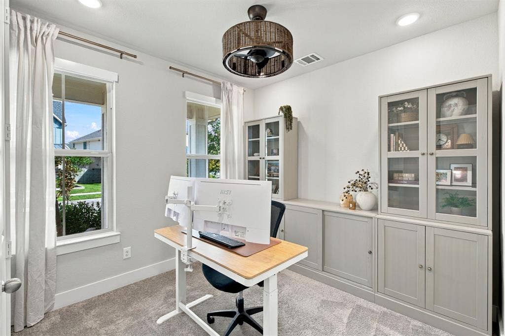 First Floor bedroom currently serving as home office.  Shelves are negotiable :)