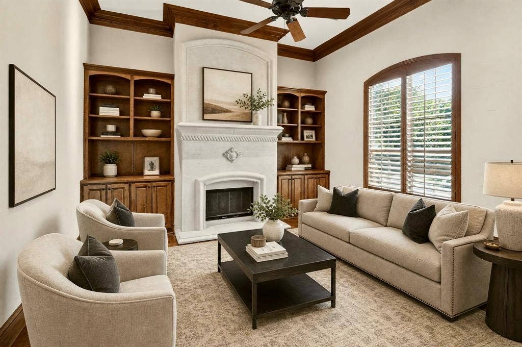 112 Winsley Circle, McKinney, TX 75071 Gorgious front room staged as a formal living. Could be a designated office with built-in shelving, stone fireplace, arched window with wood shutters