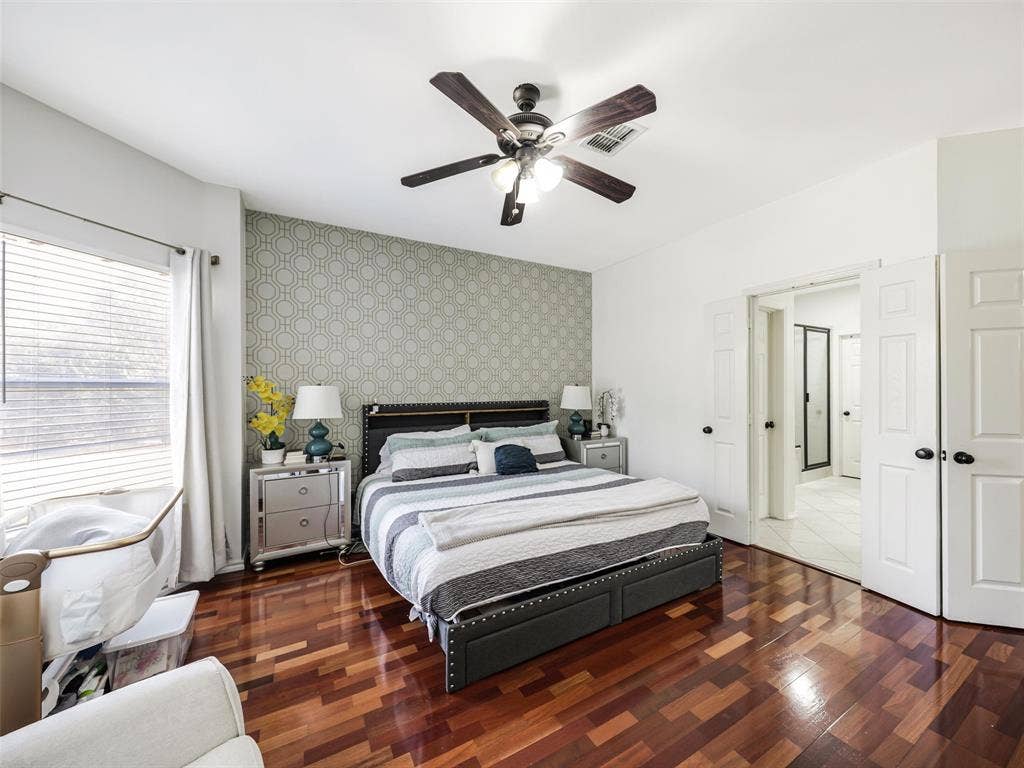 1206 Bel Air Drive, Allen, TX 75013 Hardwood flooring, ceiling fan, accent wall, French doors, and recessed lighting