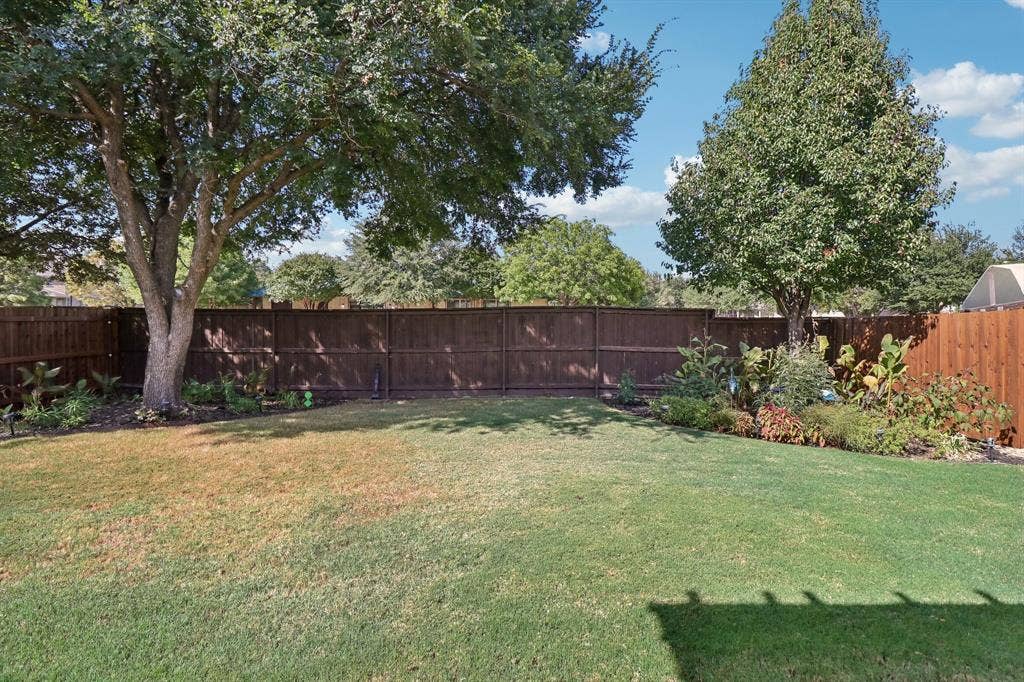 10700 Leesa Drive, McKinney, TX 75072 Landscaped Backyard