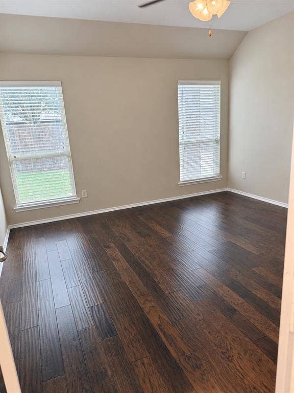 9609 Sand Trap Drive, McKinney, TX 75072 Wood-finish flooring, vaulted ceiling, and dual windows with blinds