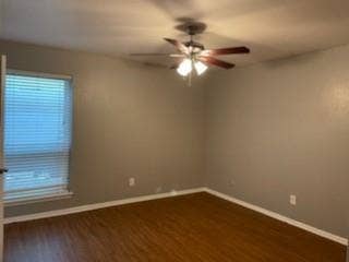 2200 W Lowden Street, #22, Fort Worth, TX 76110 Wood-finish flooring, neutral wall tones, window with horizontal blinds, and a ceiling fan with integrated lighting