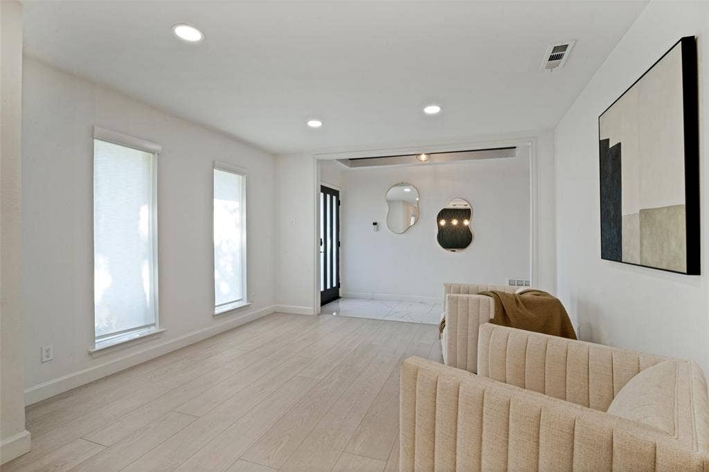 5021 Ashbrook Road, Dallas, TX 75227 Recessed lighting, wood-finish flooring, and white walls