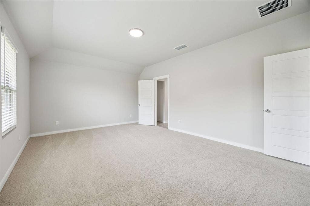 Primary Suite in the Hayden home plan by Trophy Signature Homes – REPRESENTATIVE PHOTO