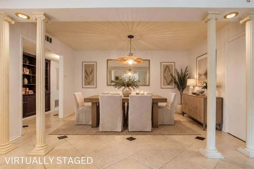Recessed lighting, decorative columns, tiled flooring with accent squares, built-in shelving, and a modern light fixture