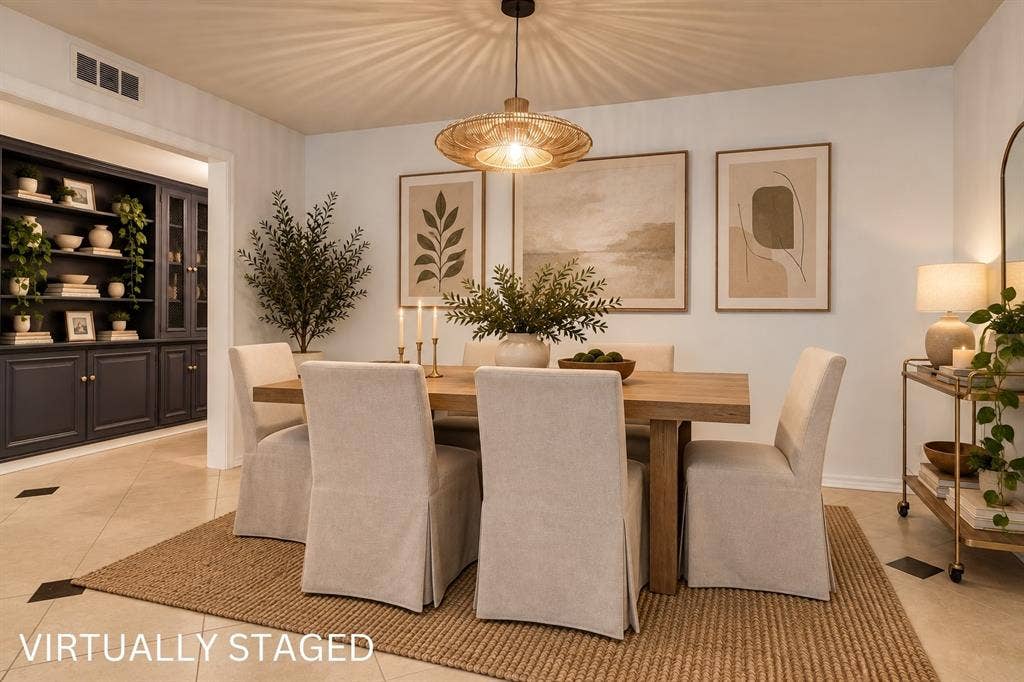 Recessed lighting, tiled flooring, built-in shelving with glass-front cabinetry, and a woven pendant light fixture