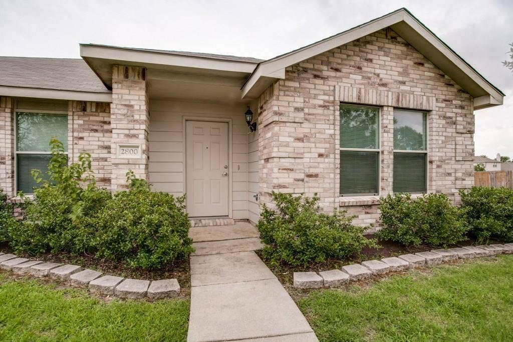 2800 Bissell Way, Wylie, TX 75098 Brick exterior with a gabled roofline