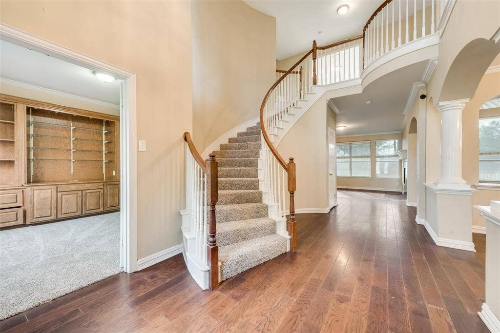 Elegant and Grand Staircase, just off the study.