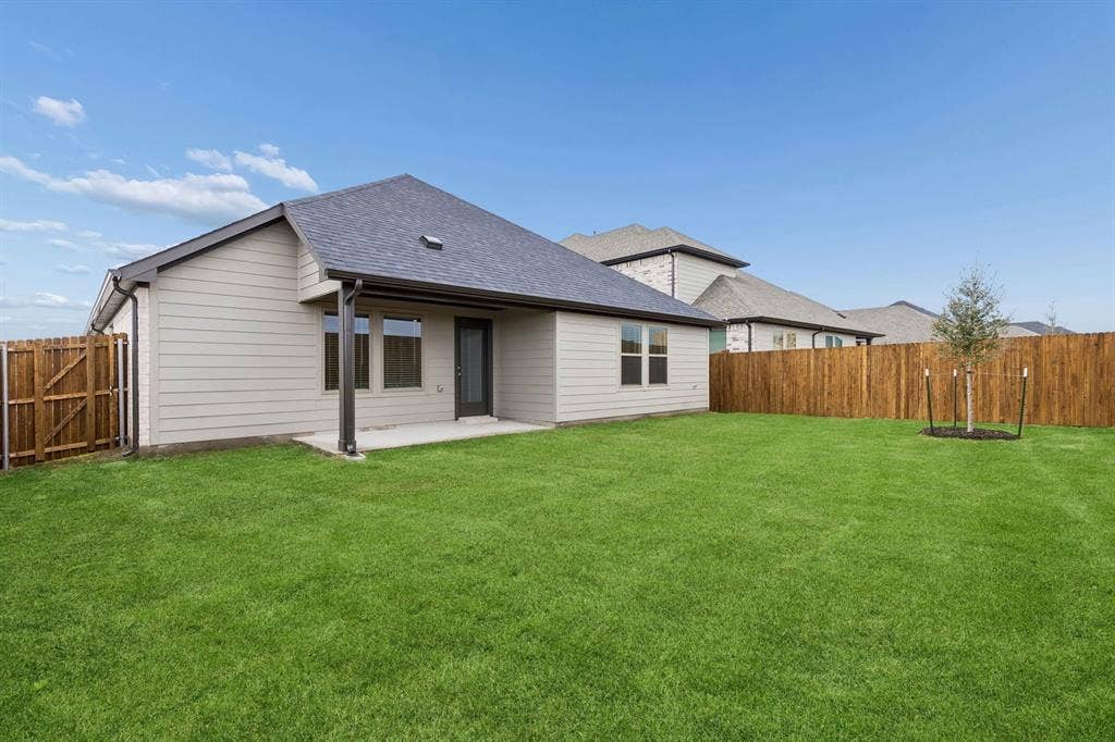 205 Whitlow Drive, Princeton, TX 75071 Patio in the Oscar home plan by Trophy Signature Homes – REPRESENTATIVE PHOTO