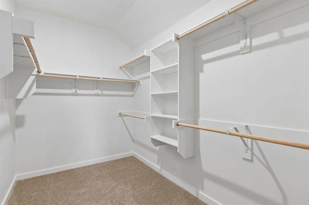 205 Whitlow Drive, Princeton, TX 75071 Primary Closet in the Oscar home plan by Trophy Signature Homes – REPRESENTATIVE PHOTO