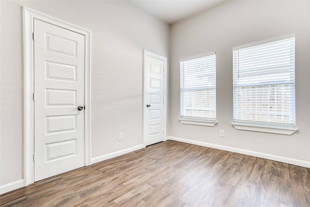 2316 Marburg Street, Dallas, TX 75215 Unfurnished room featuring baseboards and wood finished floors