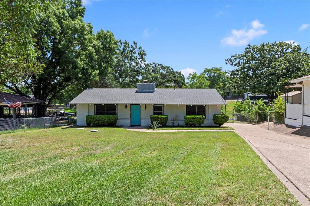 110 Henderson Harbor Circle, Payne Springs, TX 75156 White exterior facade with a contrasting turquoise front door
