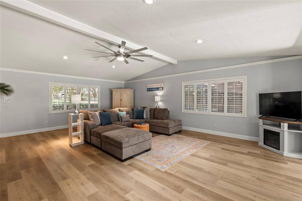 110 Henderson Harbor Circle, Payne Springs, TX 75156 Vaulted ceiling with exposed beam, recessed lighting, wood-finish flooring, and window shutters