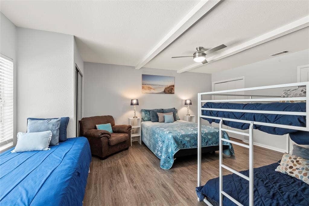 110 Henderson Harbor Circle, Payne Springs, TX 75156 Wood-finish flooring, ceiling fan, white window blinds, and built-in closet doors