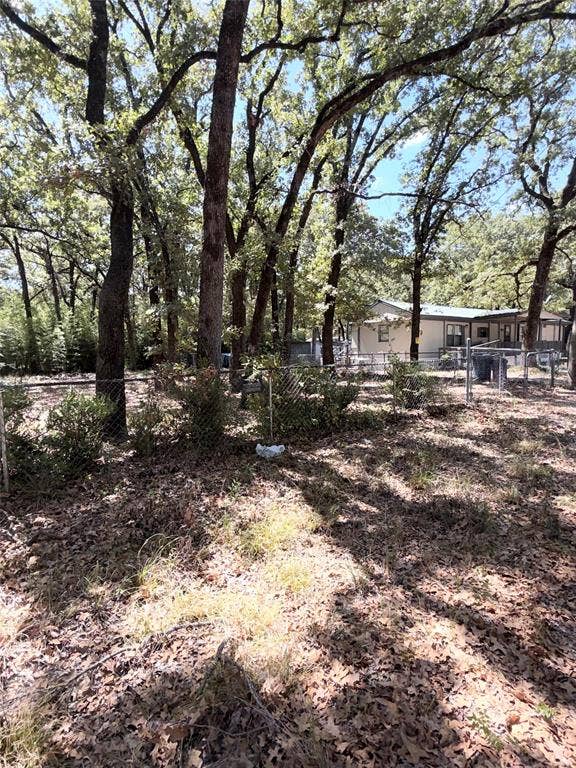 107 Meadowlark Lane, Mabank, TX 75156 Showing the extra lot next to the house