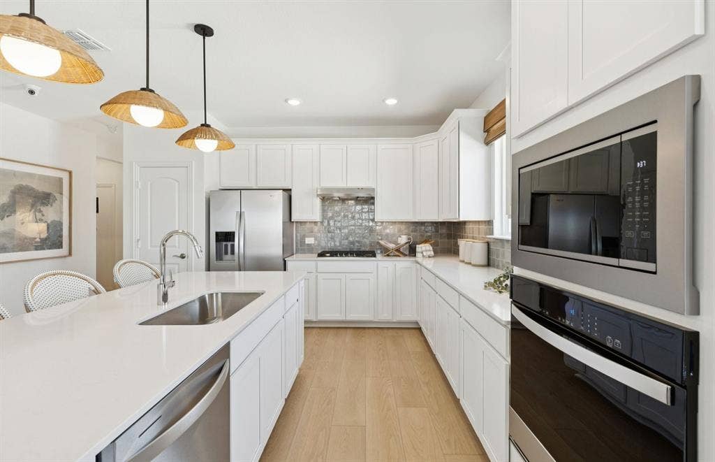 3421 Majesty Lane, Denton, TX 76208 *Model Representation - Abundant cabinet space in kitchen