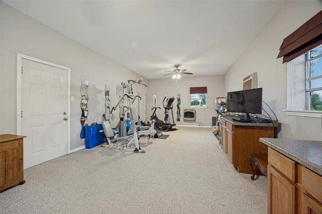 500 The Crossings Place, Lowry Crossing, TX 75069 Workshop houses a bonus room with air conditioning and LP gas heating.
