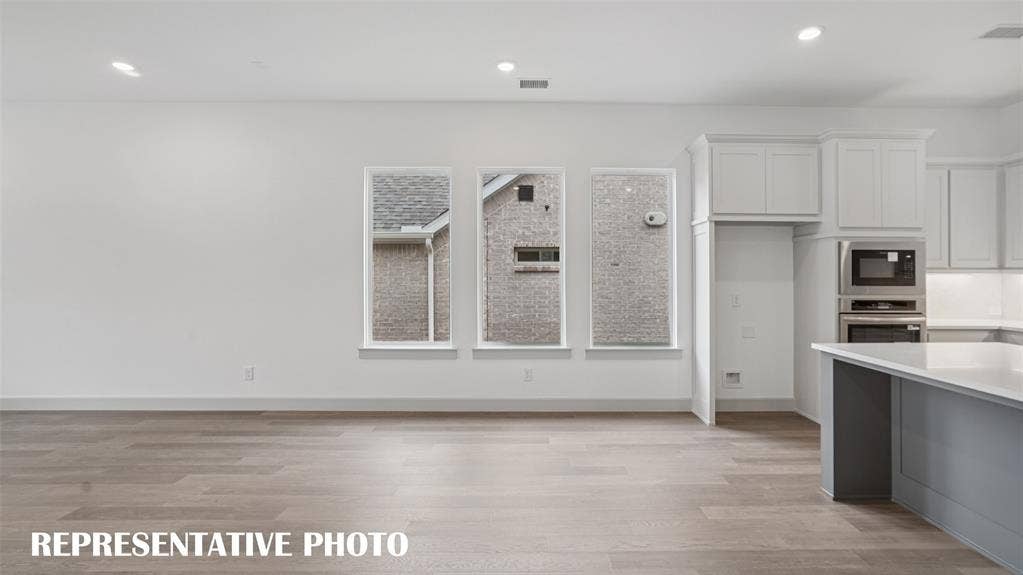 3417 Pickerel Point, McKinney, TX 75071 Perfectly located between the kitchen and the family room, this dining room is the ideal space to host lively dinner parties or cozy family gatherings. REPRESENTATIVE PHOTO