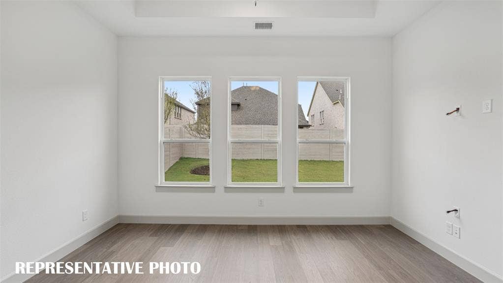 3417 Pickerel Point, McKinney, TX 75071 This dreamy owner's suite is located at the rear of the home for additional privacy. REPRESENTATIVE PHOTO