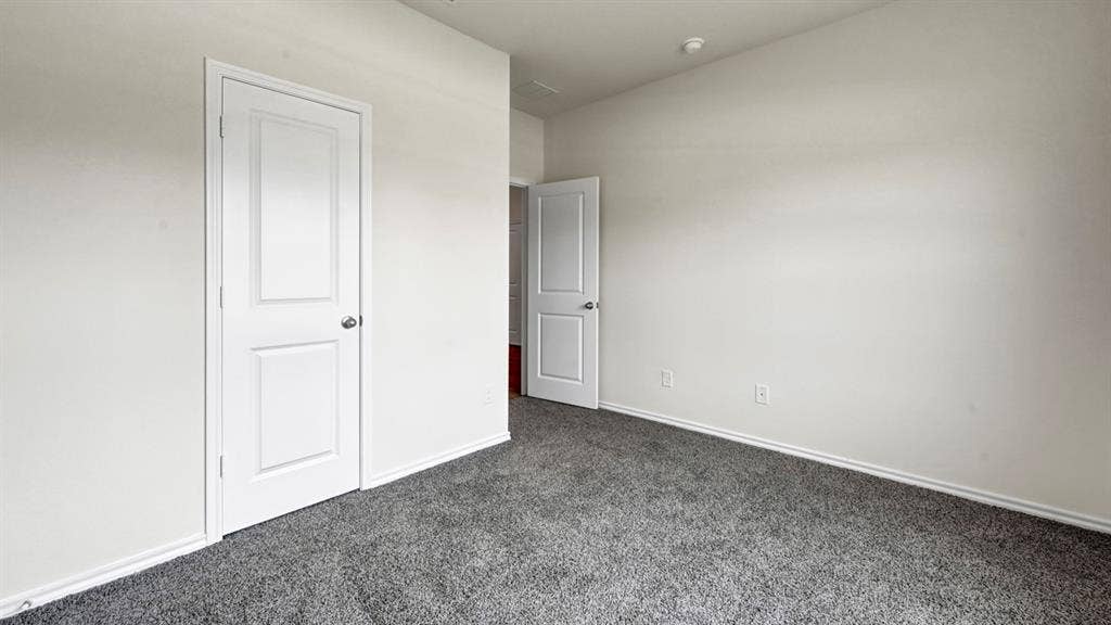 231 Yates Street, Bullard, TX 75757 Plush gray carpet, white painted walls, and white interior doors