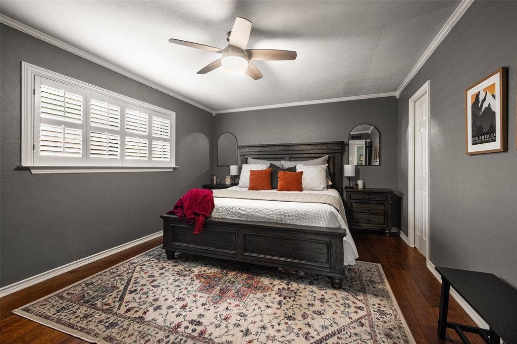10945 Middle Knoll Drive, Dallas, TX 75238 Recessed lighting, wood-finish flooring, white crown molding, ceiling fan with integrated lighting, and white window shutters