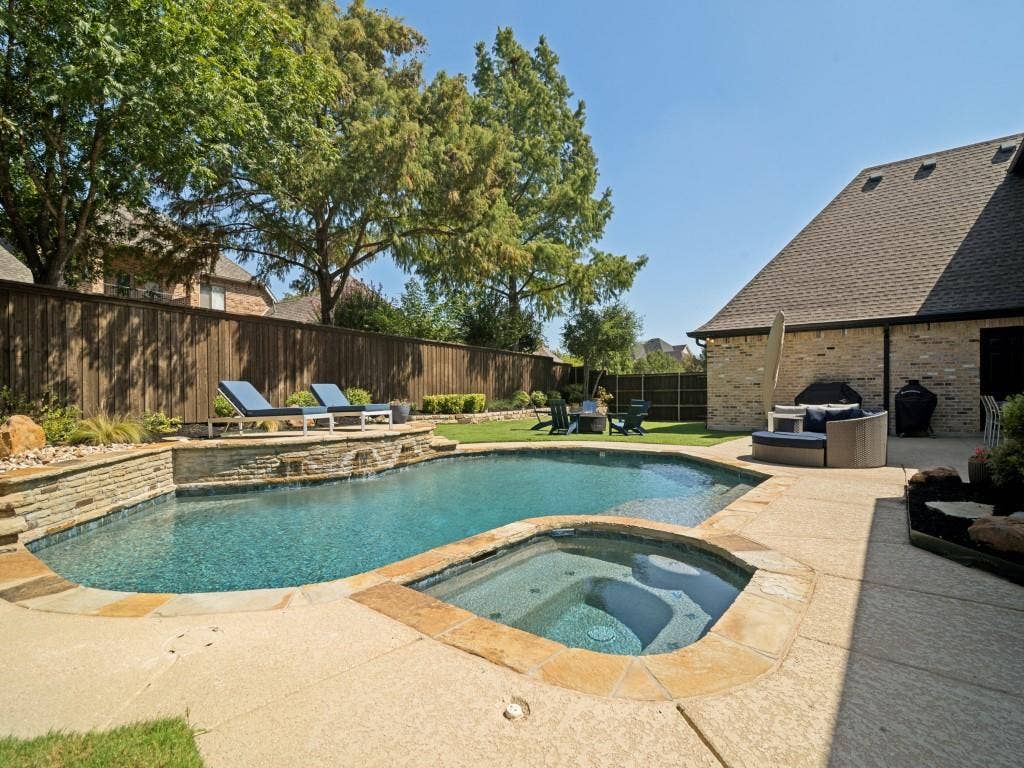 Cool off in the Texas summers!  Water feature & plenty of deck space.  Pool and spa were resurfaced in 2024.