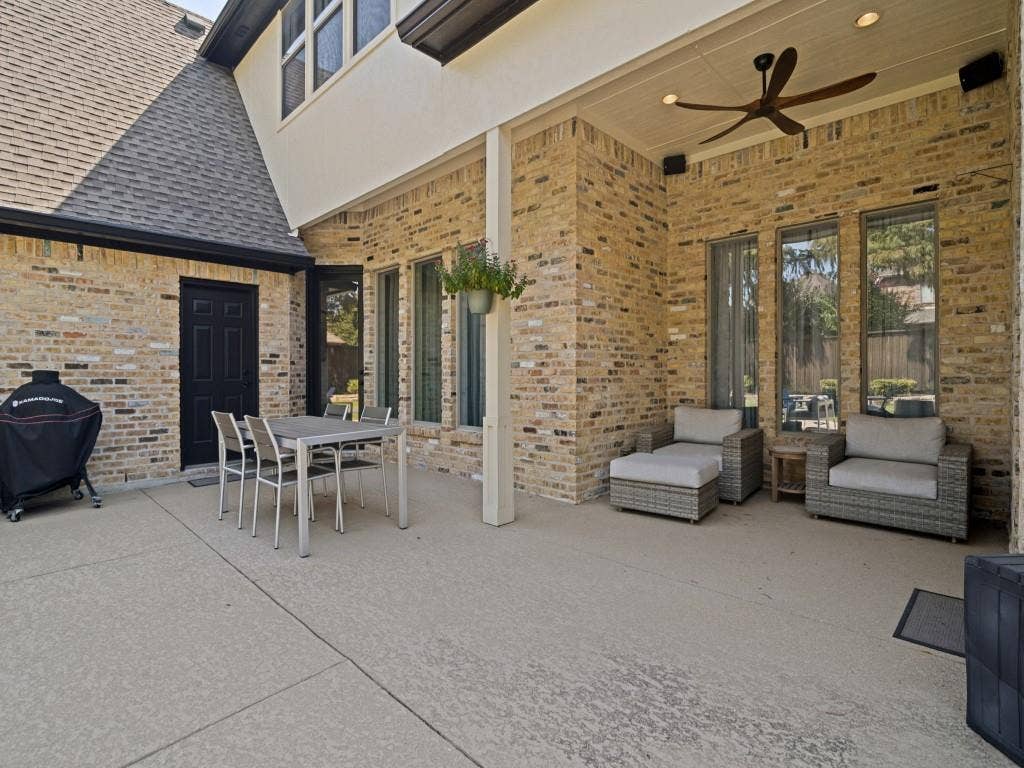 Covered and open extended back patio.