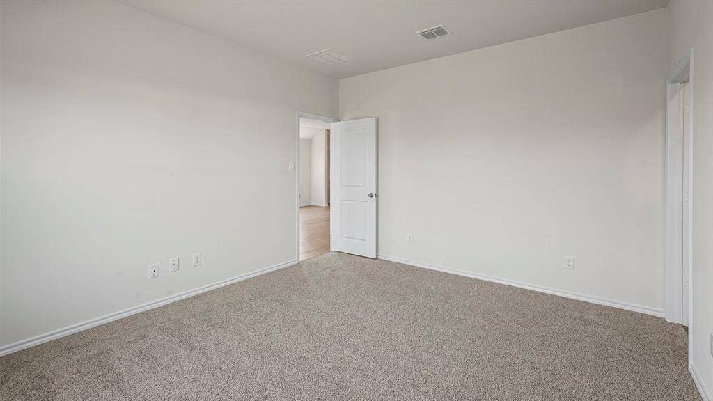215 Yates Street, Bullard, TX 75757 Neutral-toned carpeting throughout