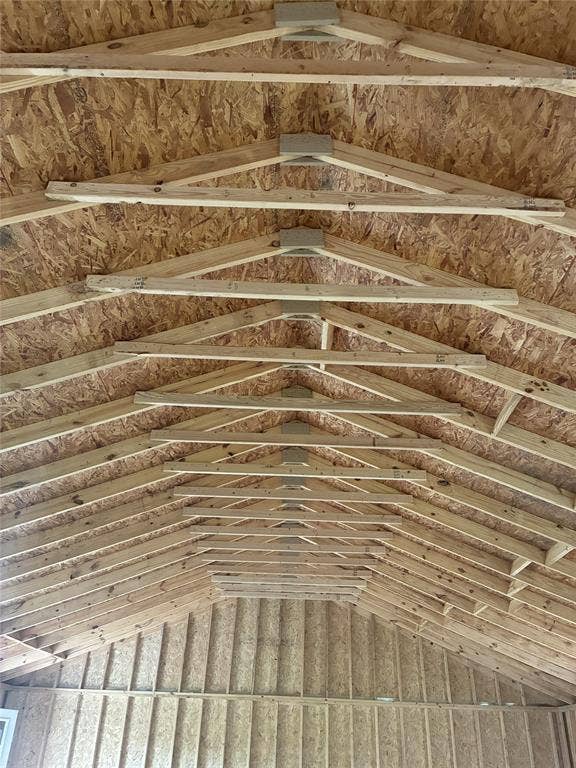13601 Woodridge, Eustace, TX 75124 Exposed wood truss ceiling with oriented strand board sheathing