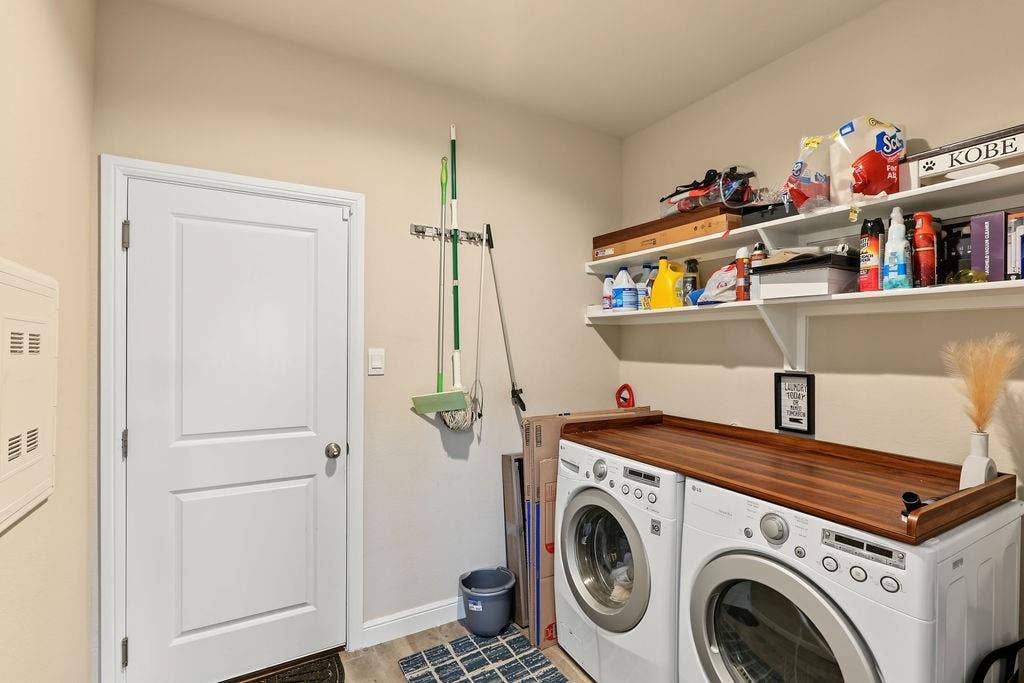 1221 Boulder Drive, Cedar Hill, TX 75104 View of laundry room with shelving