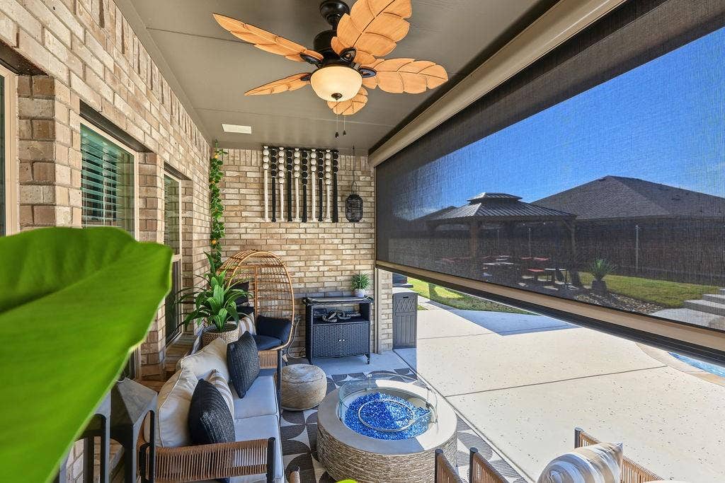 1221 Boulder Drive, Cedar Hill, TX 75104 View of back patio with pull down screen