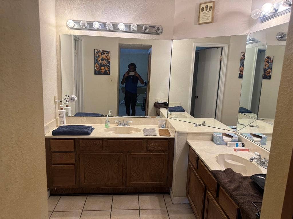 2681 Steppington Street, Grand Prairie, TX 75052 Brick exterior home featuring a single garage, shingle roof, and a front-facing window with a small overhang