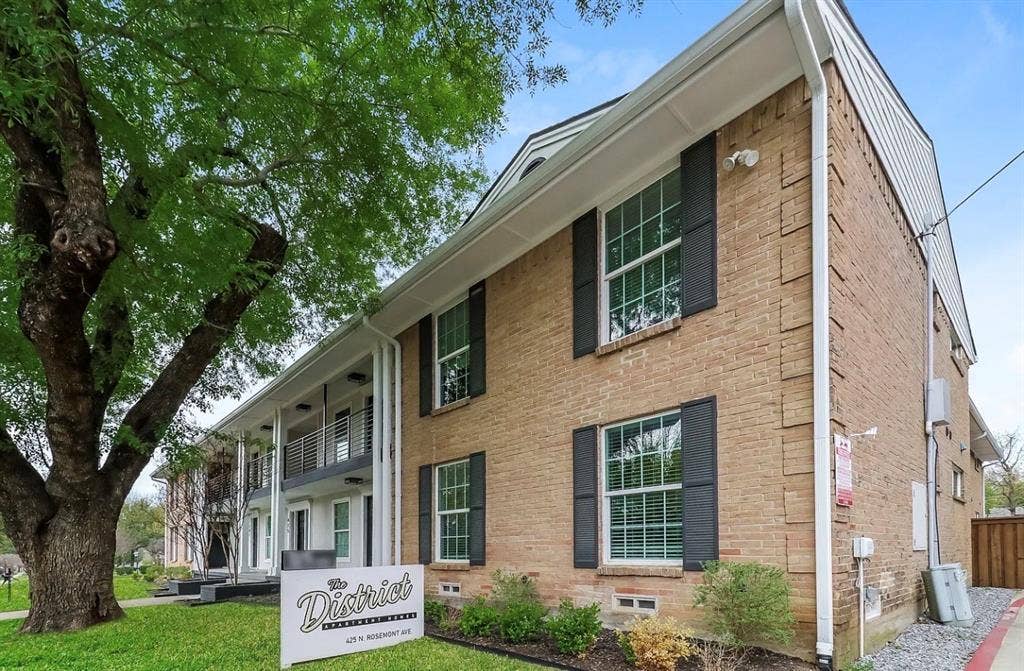 425 N Rosemont Avenue, #111, Dallas, TX 75208 Brick exterior with black louvered shutters and white trim