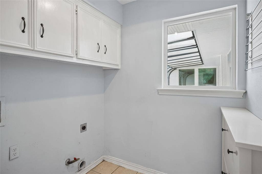 A barn door opens from the family room to the laundry room.