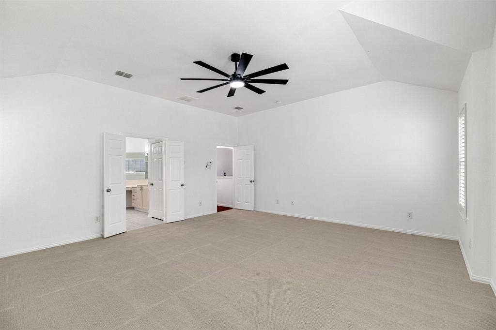 239 Glen Ridge Drive, Murphy, TX 75094 Spacious room with vaulted ceilings and recessed lighting