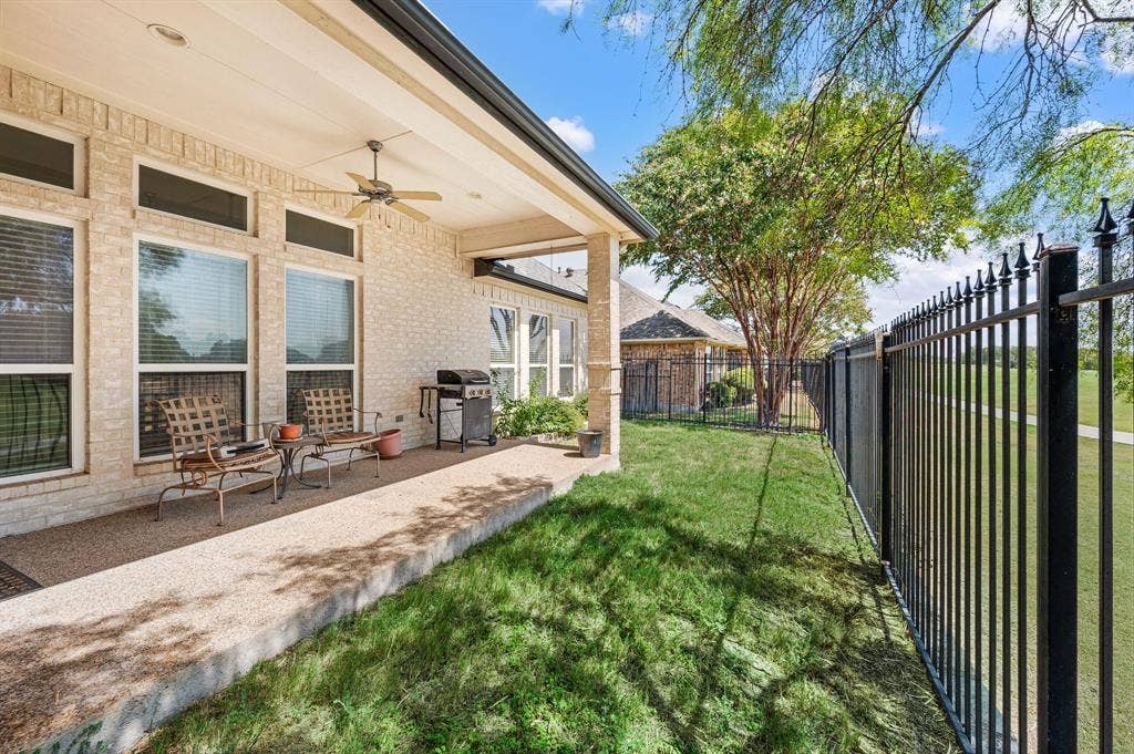 10701 Whitestone Ranch Road, Benbrook, TX 76126 back patio with view of golf course