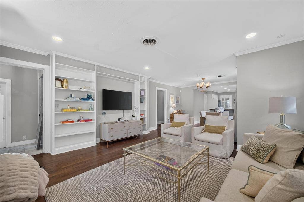 5630 Vanderbilt Avenue, Dallas, TX 75206 Hardwood flooring, recessed lighting, crown molding, built-in shelving, and an open-concept layout