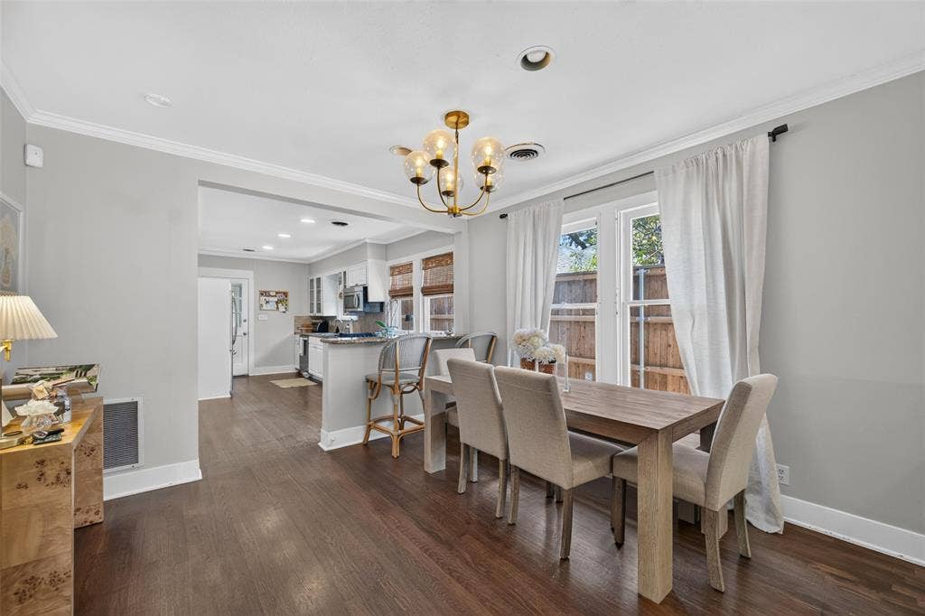 5630 Vanderbilt Avenue, Dallas, TX 75206 Wood-finish flooring throughout, recessed lighting, and a multi-light chandelier